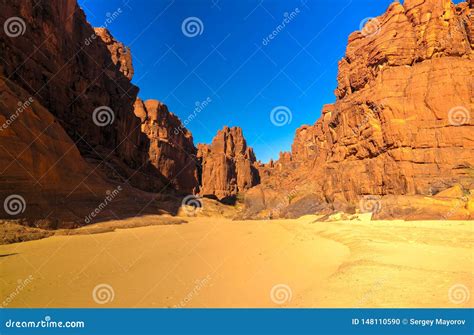 Guelta D Archei Waterhole Near Oasis Camels Drinking The Woater