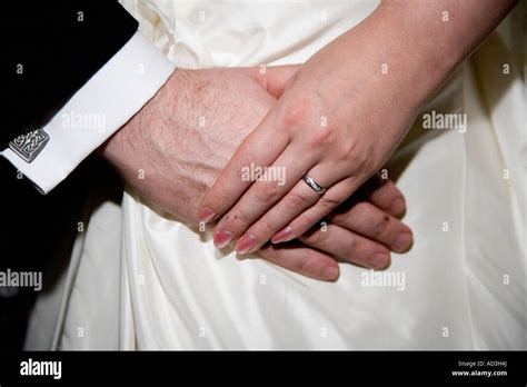 Wedding Couple Bride And Groom Holding Hands Ring And Fingers Male And Female Of Newly Married
