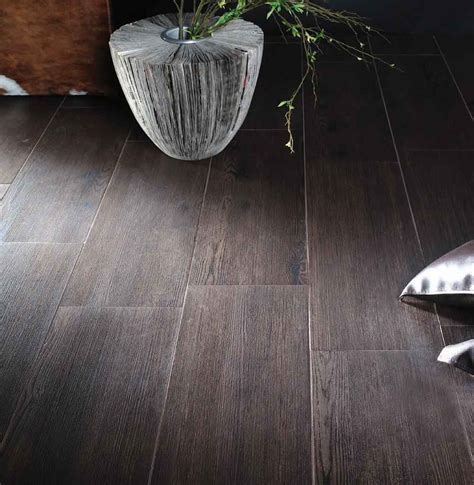 The impeccable quality of these dark ceramic floor tiles will ensure that your house remains modern for a very long time. Wood Grain Ceramic Tile Flooring