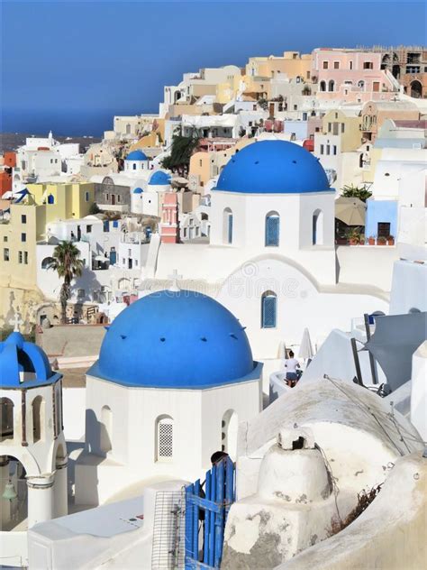 Beautiful Blue Domed And White Buildings In Santorini