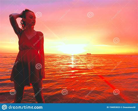Sunset Woman In Red Dress At Sea Stock Image Image Of Limb Blond