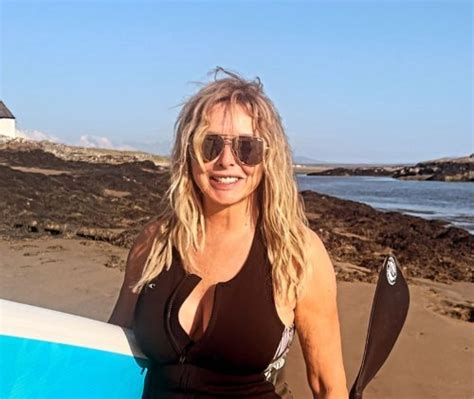 Carol Vorderman Sends Fans Wild As She Poses In Unzipped Wetsuit As She