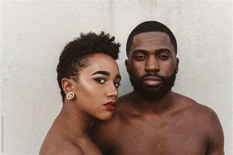 A Young Black Couple Facing Each Other Del Colaborador De Stocksy