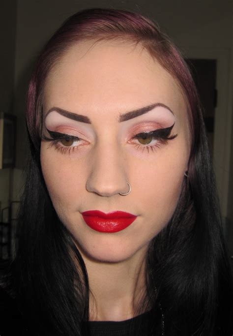 Glitter Is My Crack Thick Black Liner And Red Lips Makeup Look