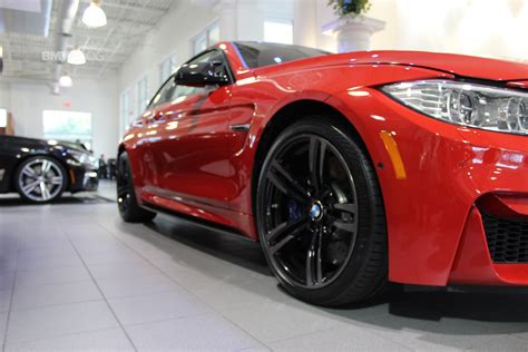 Modern problems require modern solutions. BMW M4 in Ferrari Red looks gorgeous