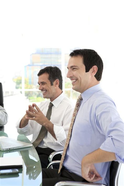 Business Executives Having Fun At A Meeting Stock Photo Image Of