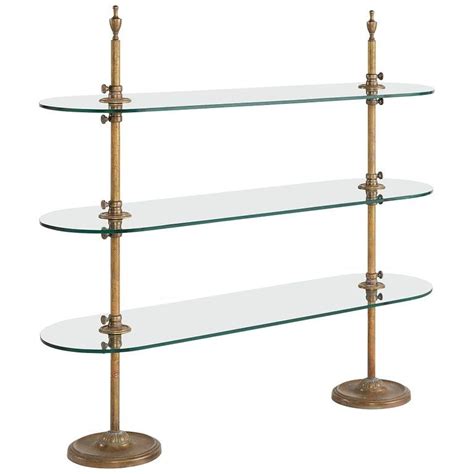 Daily essentials like plates, glasses, coffee mugs, etc. Brass and Glass Bistro Shelving Unit, circa 1910 in 2020 ...
