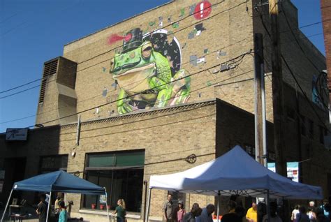 The glitch frog by european artist mto is a milwaukee icon 🐸. Plenty of Horne: Black Cat Mural Alley Opens » Urban Milwaukee