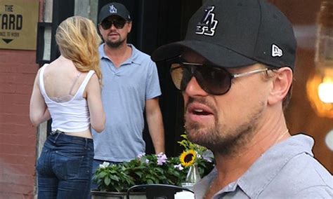Leonardo Dicaprio Chats With A Shapely Blonde In Nyc