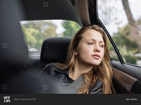 Blonde Woman Staring Out Of A Car Window Stock Photo Offset
