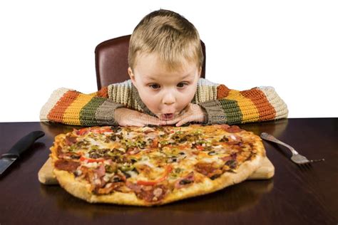 Boy Eating Pizza Stock Photo Image Of Surprise Large 65820222