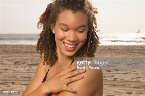 Smiling Teenage Girl On Beach Photo Getty Images