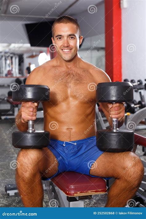 Guy With Naked Torso Lifting Dumbbells Stock Photo Image Of Positive Endurance