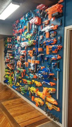 I use 1x4s and 1x2s. DIY: NERF GUN WALL | DIY Projects | Kids room organization, Boy room, Kids room