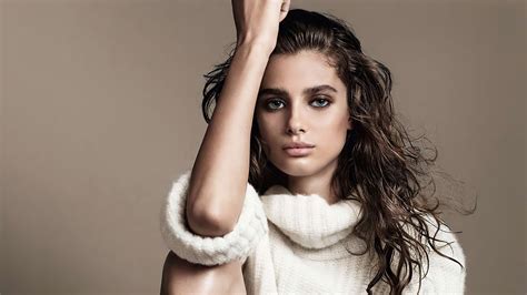 White Sweater Wearing Taylor Marie Hill With Gray Eyes In