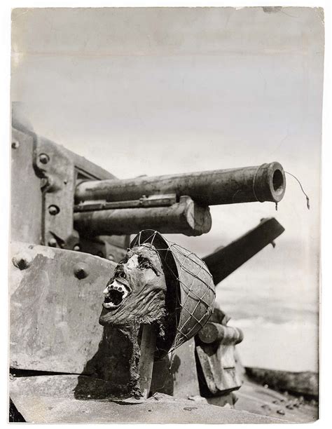 A Japanese Soldiers Skull Is Propped Up On A Burned Out Jap Tank By U