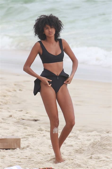 Imaan Hammam Shows Off Her Bikini Body And Goes Surfing At Ipanema