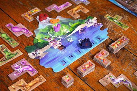 An unboxing and look at the components of the isle of cats expansion late arrivals published by the city of games. The Isle of Cats - The City of Games
