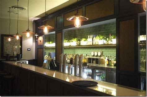 The raised bar top is cypress wood from the owners property. Cocktail bar at Woolwich Pier Hotel, Sydney | Hotel, Home ...