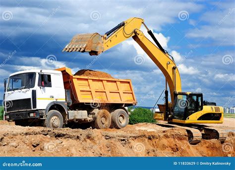 A Dumper Truck Used In A Carrara Marble Quarry. Large Yellow Dum Stock