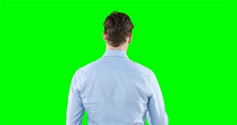 Caucasian Man Back To Camera On Green Background Stock Video Footage 0017 Sbv 346596493