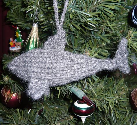 Free shark week crochet shark patterns including shark hats and shark slippers to crochet. Free knitting pattern for Great White Christmas shark ...