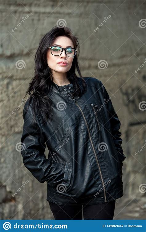 Beautiful Positive Fashionable Stylish Modern Brunette Girl In Trendy Glasses Looking At Camera