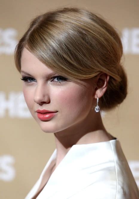 Taylor Swift Classic Sleek Chignon With Side Swept Bangs Hairstyles
