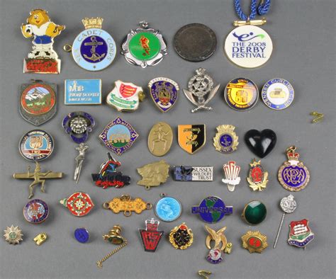 A Collection Of Enamelled Lapel Badges And Pins 26th August 2015