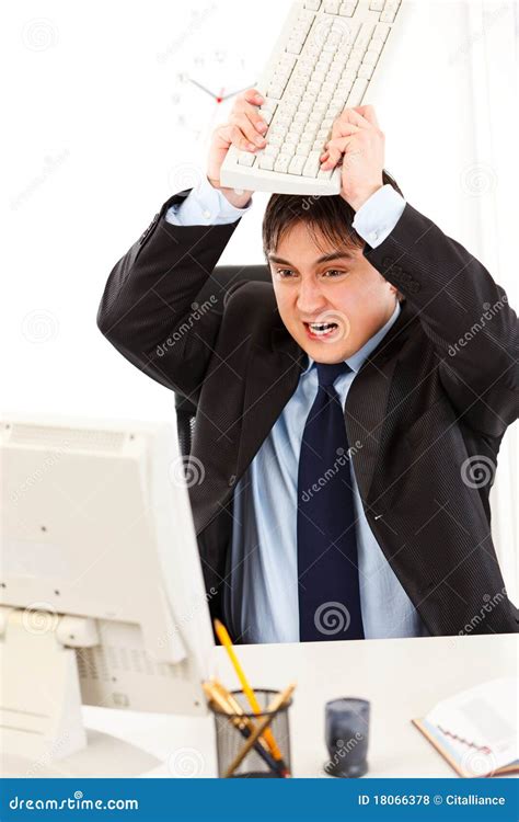 Businessman Destroying Computer Using Keyboard Stock Photo Image Of