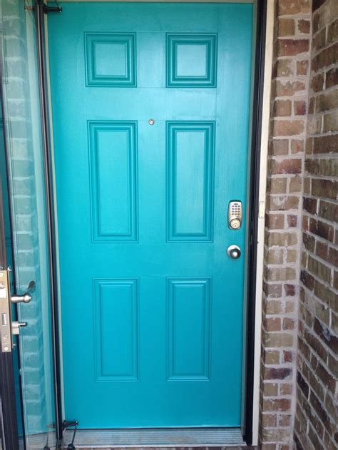 The style is clean and classic and really pops against the reddish brown brick. La Fonda Turquoise Valspar- front door | For the Home ...