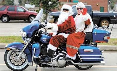 Santa And Mrs Claus Trade In Sleigh For Harley Davidson Motorcycle