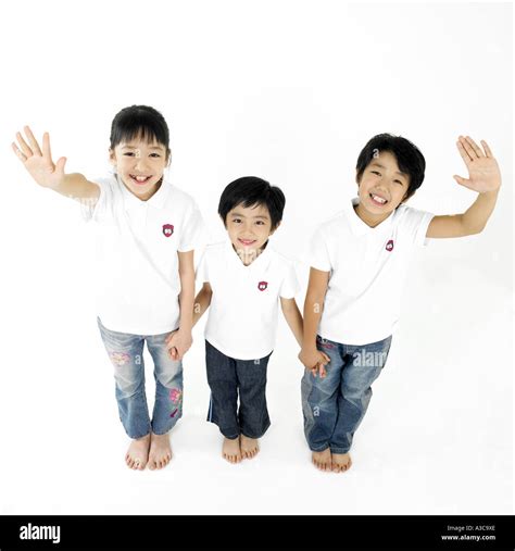 Three Children Saying Hello Stock Photo Alamy