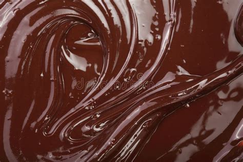 turbinio fuso del cioccolato come primo piano del fondo fotografia stock immagine di chiusura
