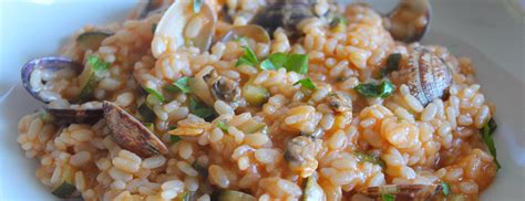 Un primo dove il radicchio, re incontrastato di questo piatto, incontra le vongole. Risotto di vongole veraci e cozzeMimì e Cocò