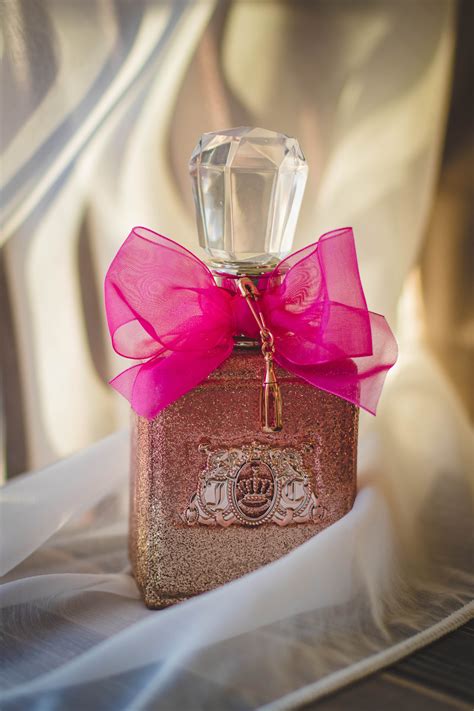 Free Photo Close Photograph Of Glitter Pink Fragrance Bottle With Red