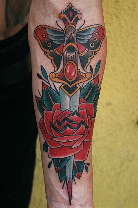 Old School Red Rose With Dagger Butterfly Wings Forearm Tattoo