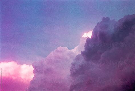 Surreal Purple Sunset Sky Filled With Clouds By Stocksy Contributor