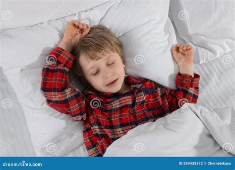Little Boy Snoring While Sleeping In Bed Top View Stock Photo Image