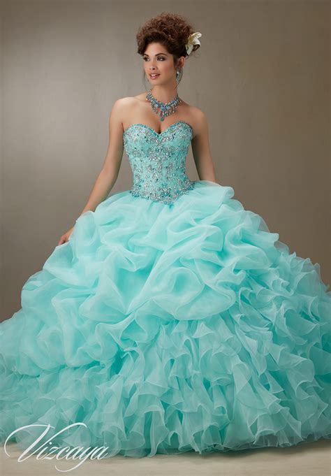 Since a church celebration is a key part of the quinceañera, a religious gift is an appropriate and popular choice. Beaded Bodice Quinceanera Dress | Morilee