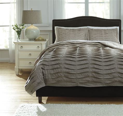 Find stylish home furnishings and decor at great prices! Voltos Dark Brown King Duvet Cover Set from Ashley ...