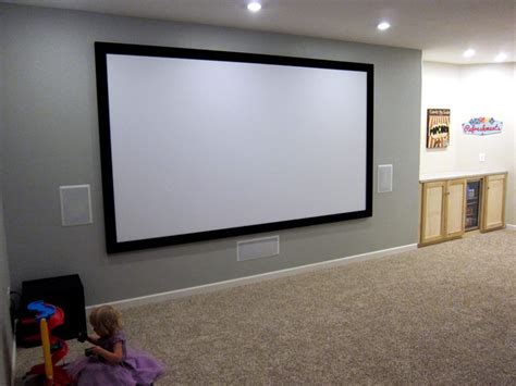 10 awesome basement home theaters that deliver movie magic! Basement home theater ideas. 135" fixed frame screen ...