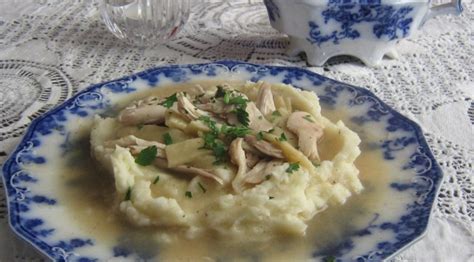 Great Grandmas Chicken And Noodles Over Mashed Potatoes And Gravy