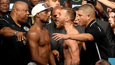 conor mcgregor floyd mayweather both make weight for bout