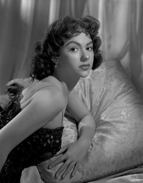 An oscar, emmy, tony and grammy. Picture of Rita Moreno
