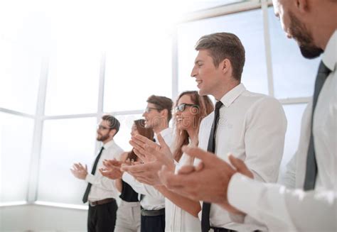 Young Employees Of The Company A Standing Ovation Stock Photo Image