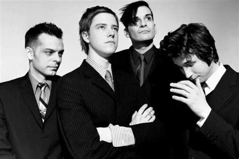 Memory Banks: Interpol Look Back at 'Turn On the Bright Lights' | SPIN