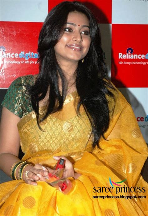 Tollywood Actress Sneha Hot Look In A Yellow Saree Latest Pics