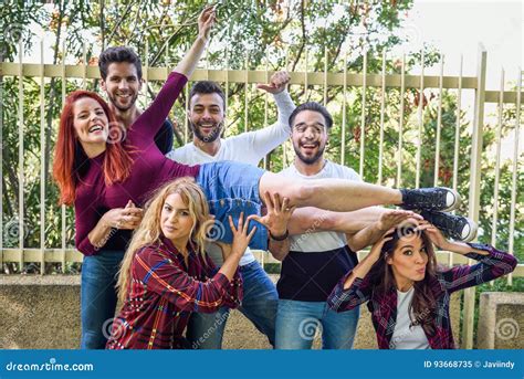 Group Of Young People Together Outdoors In Urban Background Stock Image