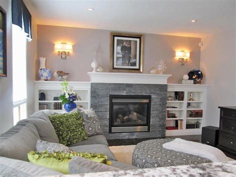 Below are some beautiful examples of a beige and gray scheme. This neutral living room features a gray stacked stone fireplace surrounded by built-in whit ...